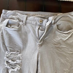 American Eagle Gray Ripped Skinny Jeans. size 12